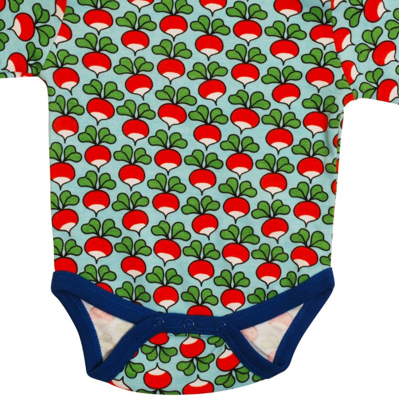 DUNS Baby onesie with red and white radish pattern on a light blue background