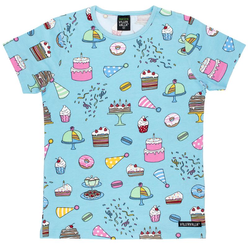 Light blue Villervalla t-shirt with colorful dessert pattern on a white background