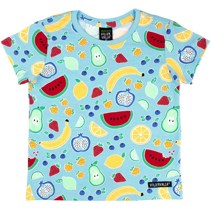 Child wearing a colorful Villervalla t-shirt with fruit patterns outdoors